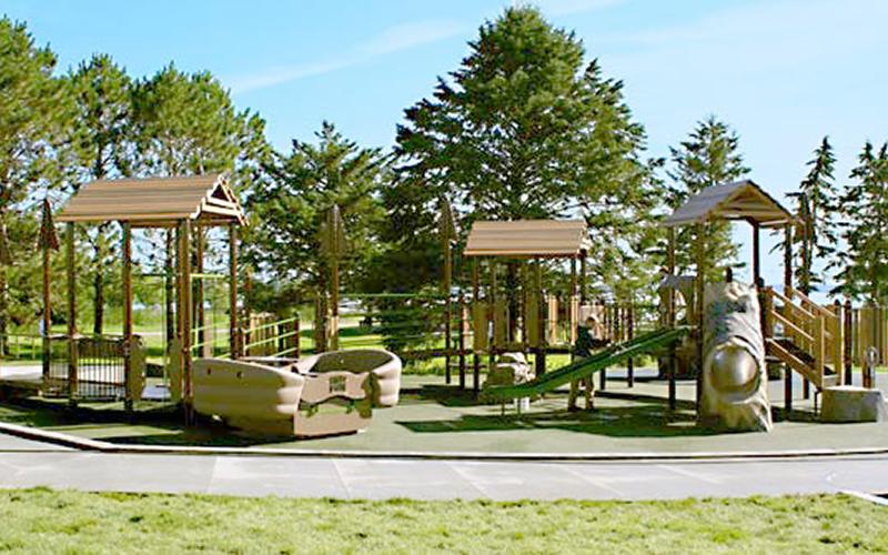 paul bunyan park with child on the slide