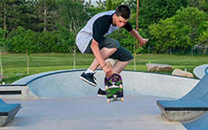 kid skateboarding at skate park